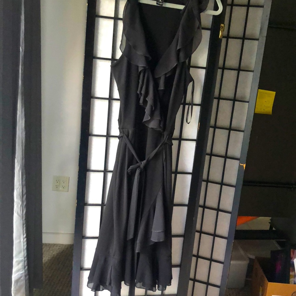 White House Black market little black dress with flirty ruffle neck line and hem